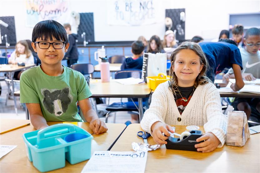 Students build penguin nests during an experiment